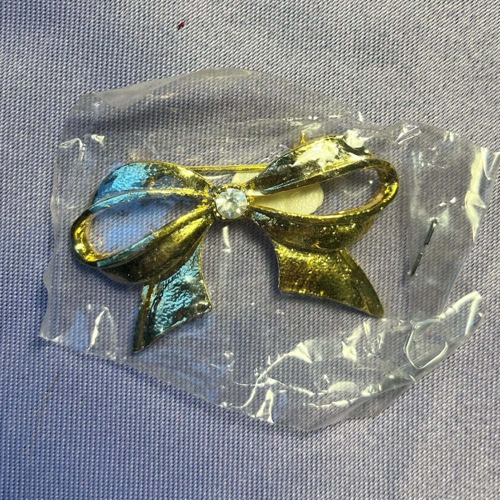 Elegant Gold and Silver Bow Brooch